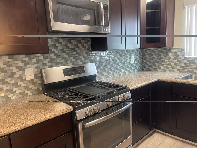 Everything you need: 4 burner gas stove, Microwave, garbage disposal, dishwasher. fridge - 2411 Prospect Ave