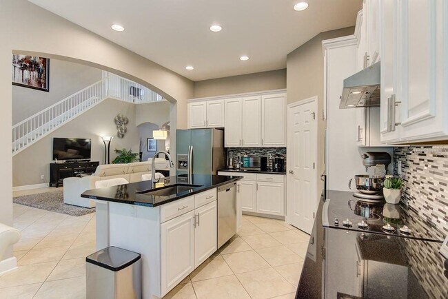 Building Photo - 4/3 Stylish and Spacious 2-story home with...