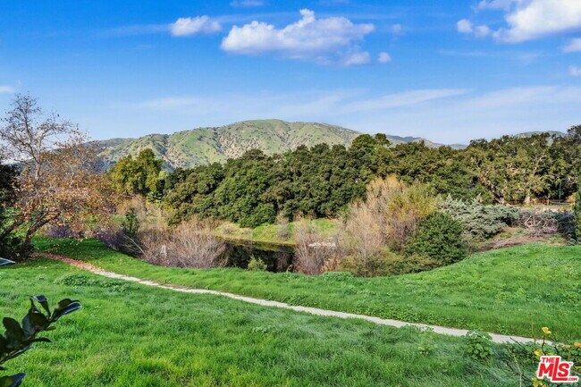 Building Photo - 6497 Country Club Dr