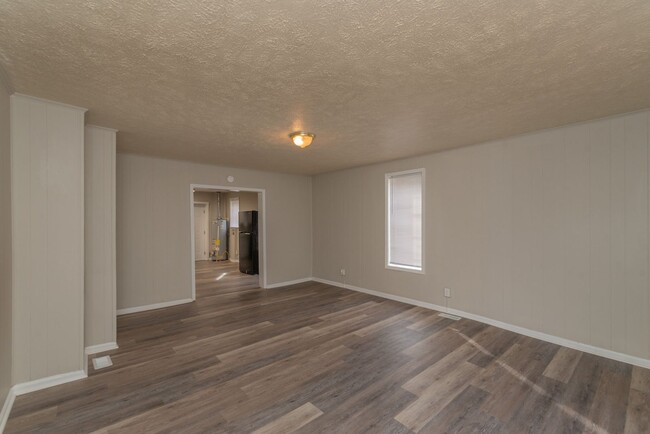 Building Photo - Brick home with a fenced-in yard!