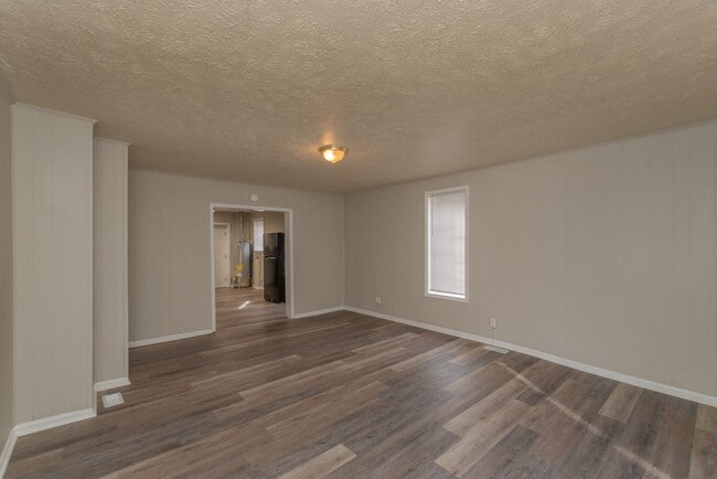 Building Photo - Brick home with a fenced-in yard! Section 8 accepted