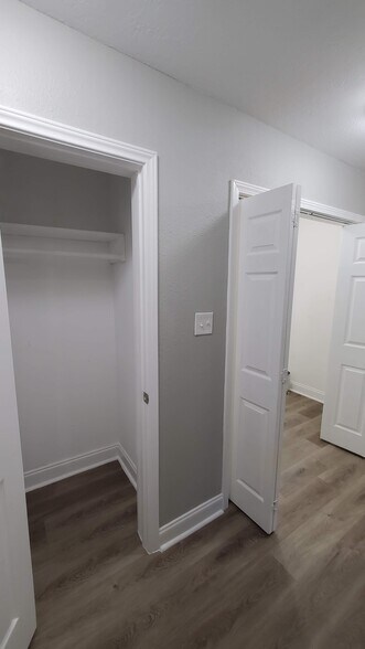 Coat closet and utility room in hallway - 320 S Ashbel St