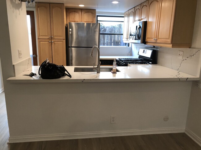 Kitchen with new countertops and backsplash - 3644 Villa Terrace