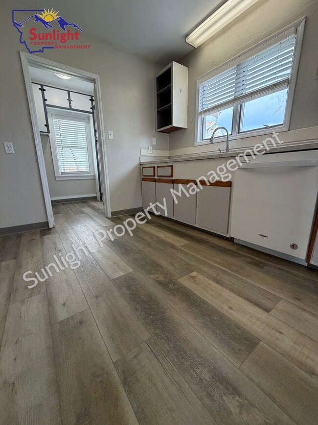 Building Photo - 2 Bed, 1 Bath Home with Detached Garage, Fenced Yard, and Built-In Storage