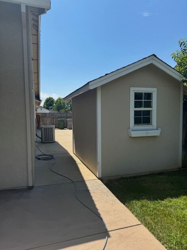 Building Photo - Enterprise Neighborhood 3 Bedroom Home with bonus room and 3 car garage- Landscaping Included!