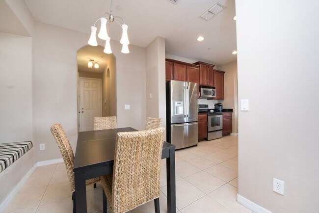 Building Photo - Large, Executive style 3/2.5 Lakefront/POOL Home in East Park of Lake Nona