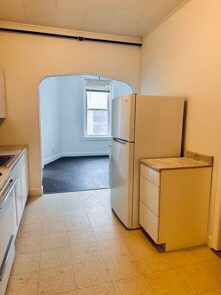 Kitchen into living room - 1214 Main St