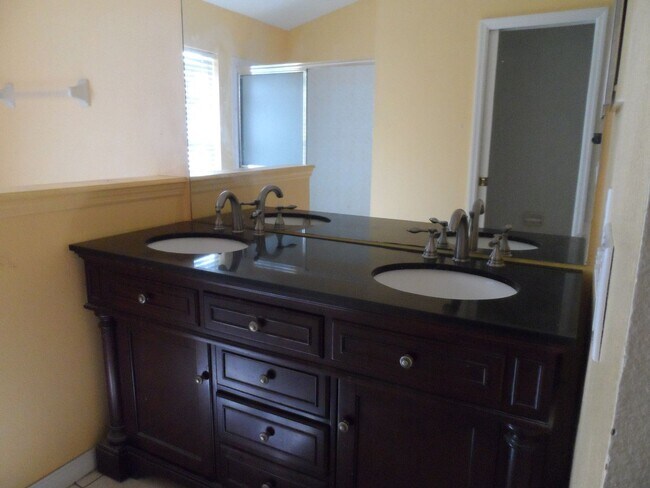 Building Photo - 4 BEDROOM - GATED TWIN LAKES SUBDIVISION -...