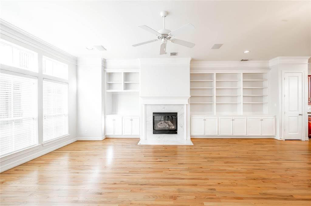 Gas Fireplace Flanked With Custom Built Ins For Storage - 643 Hartman St