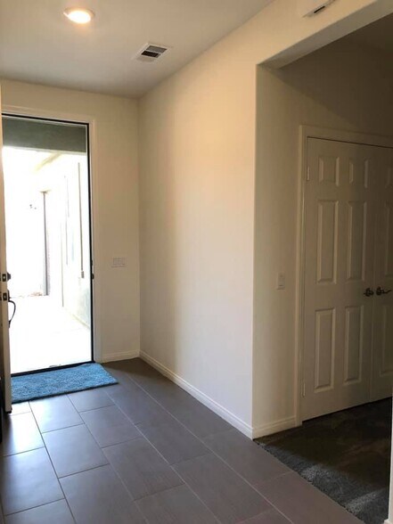 main entrance (shared with the main duplex unit) - 7893 Boot Straps Ct