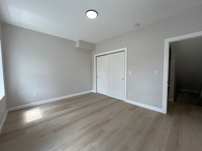 Building Photo - A real stunner! The full renovation is the first thing you'll notice..