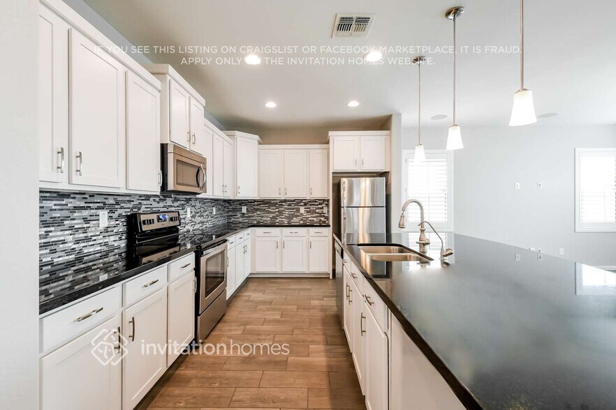 Building Photo - 12141 W Desert Moon Way