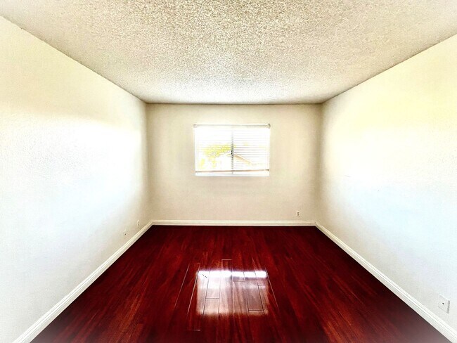 Building Photo - 2-Bedroom, 2-Bath Upstairs Condo Unit in Gated Pomona Community, Water/Trash/HOA Included!