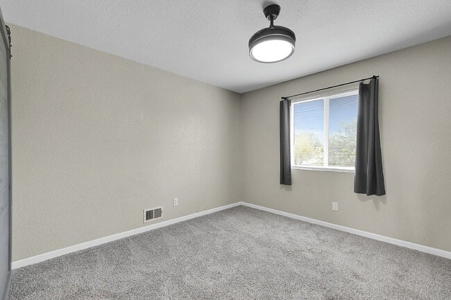 Building Photo - $1,495, 2-bed, 1.5 bath Unit in CO Springs with Assigned Parking Spot.