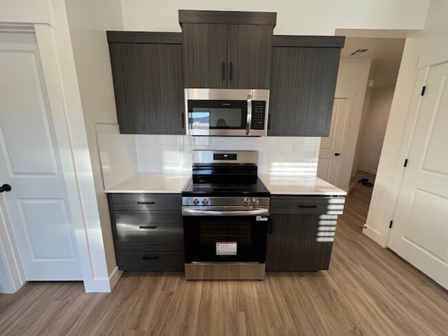 Building Photo - BRAND NEW South Desert Townhome with EVSE Outlet