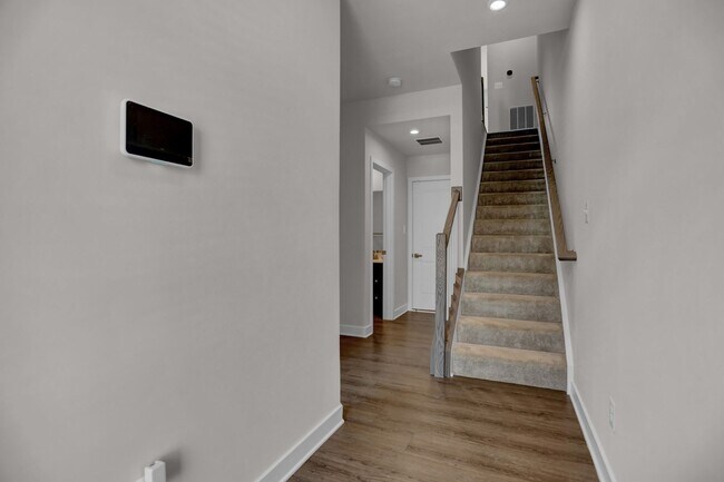Building Photo - Luxury 4-Story Townhome with Rooftop Terrace!