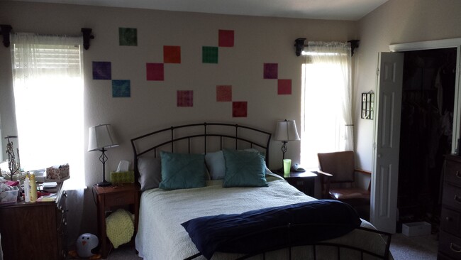 Master Bedroom - queen bed shown with nightstand on both sides - 6440 Silver Mesa Dr