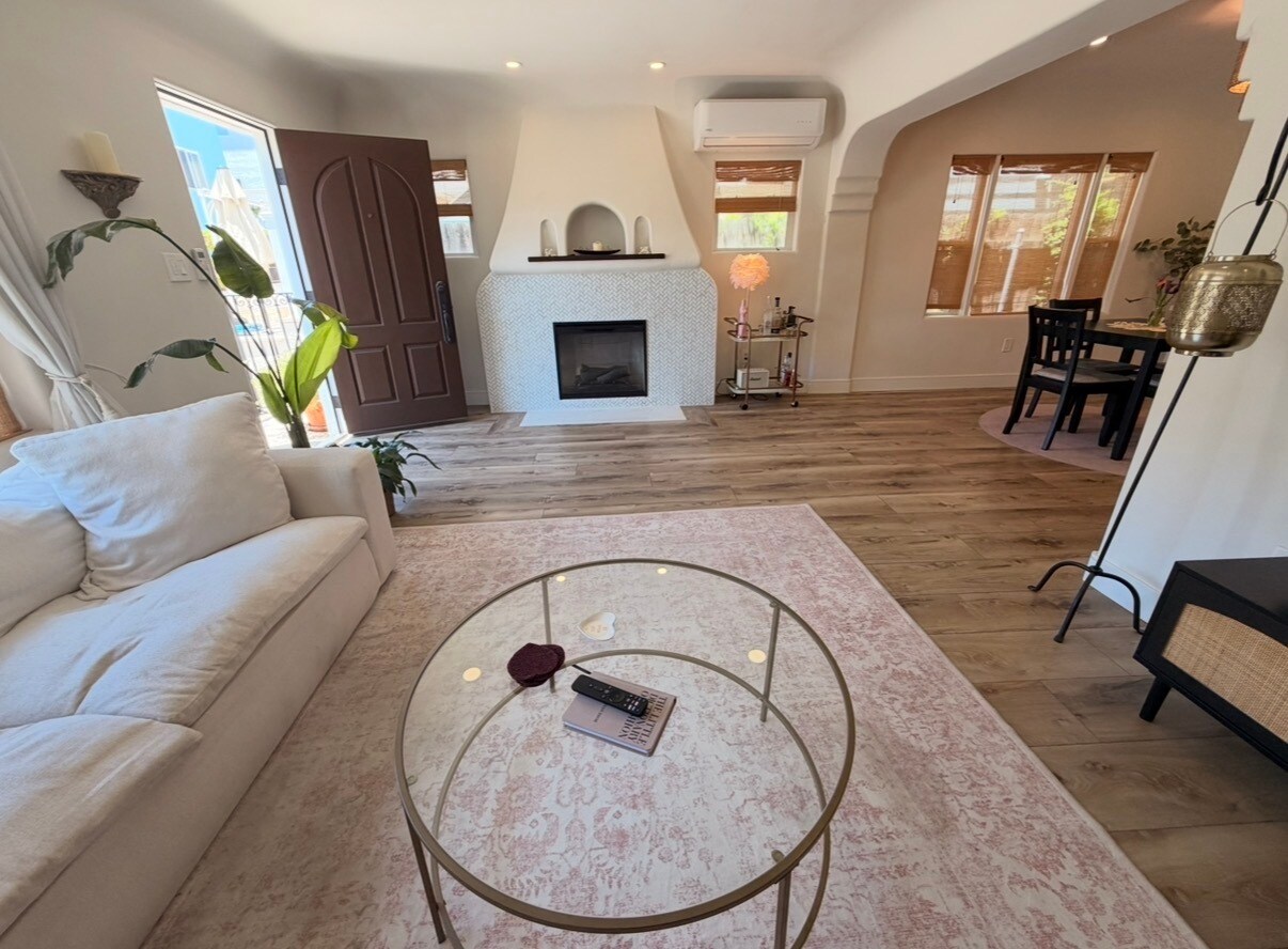 Open living room with fire place. - 726 Cohasset Ct