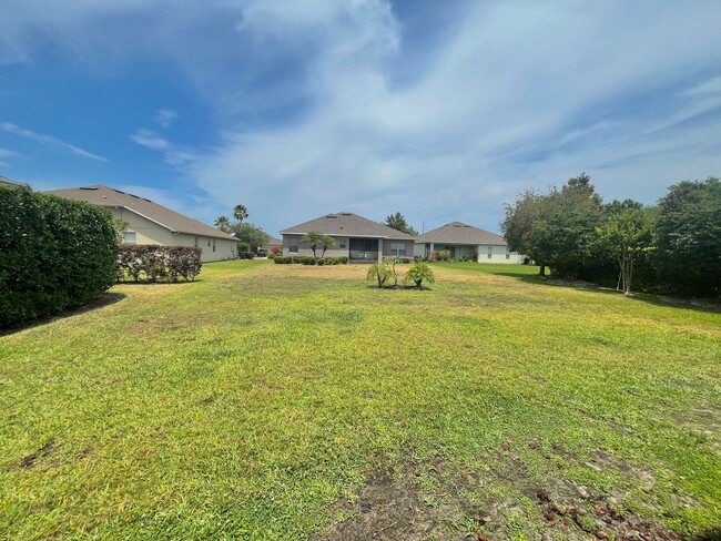 Building Photo - Spacious 4-Bed, 3-Bath Home in Guard-Gated...
