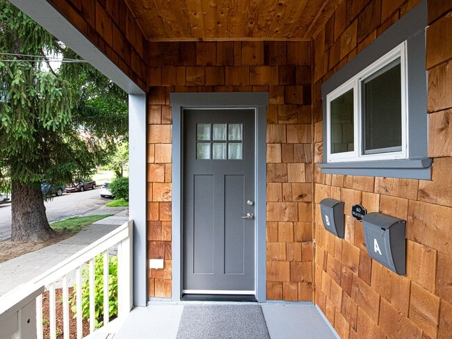 Building Photo - $300 off first month! Pristine 1-bdrm designer remodel. 1898 Kerns duplex with A/C, 1 block to 28th