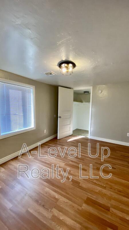 Building Photo - 3909 S 14th Ave