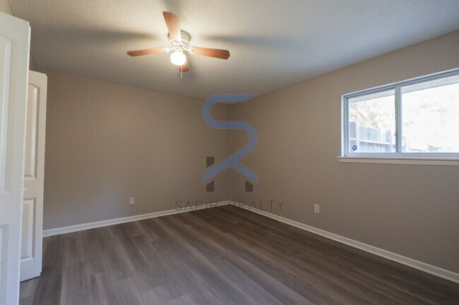 Building Photo - Move in before December 31st and choose your reward: a $250 Amazon Gift Card or a 55" Smart TV!