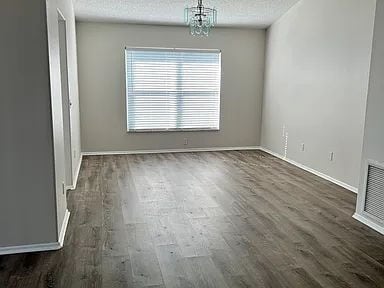 Building Photo - Freshly painted exterior and neutral color interior.