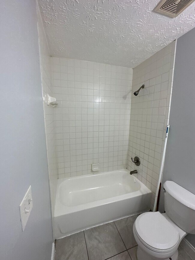 Building Photo - Fully Renovated 3/1.5 -Single Family! Avai...