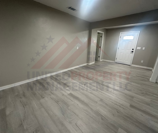 Building Photo - 3 bedroom, 2 bathroom home on large lot close to High School