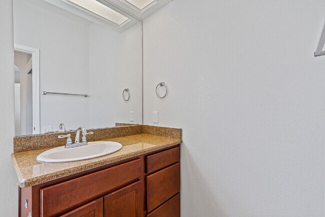 Building Photo - "Spacious 4-Bed Oasis with Granite Touches...