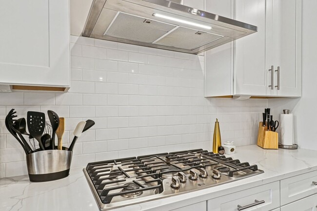 Building Photo - Your new home awaits you! Luxury Townhouse...
