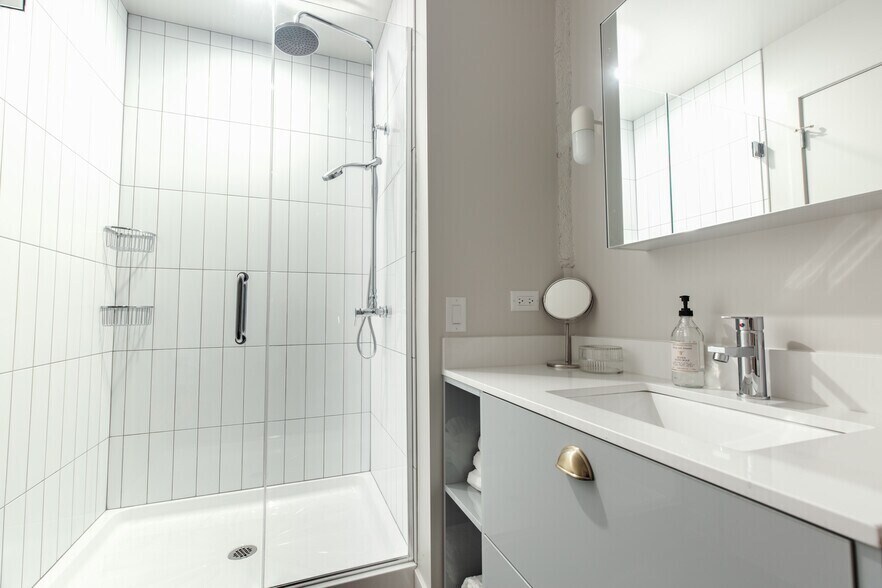 Full glass Rain Shower - 154 W Erie St