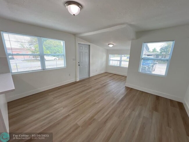 Building Photo - 10540 NW 28th Ave
