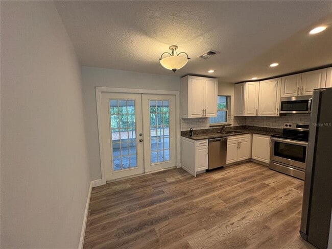 Building Photo - 5825 Lullaby Ln