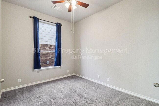 Building Photo - 10208 High Noon Dr