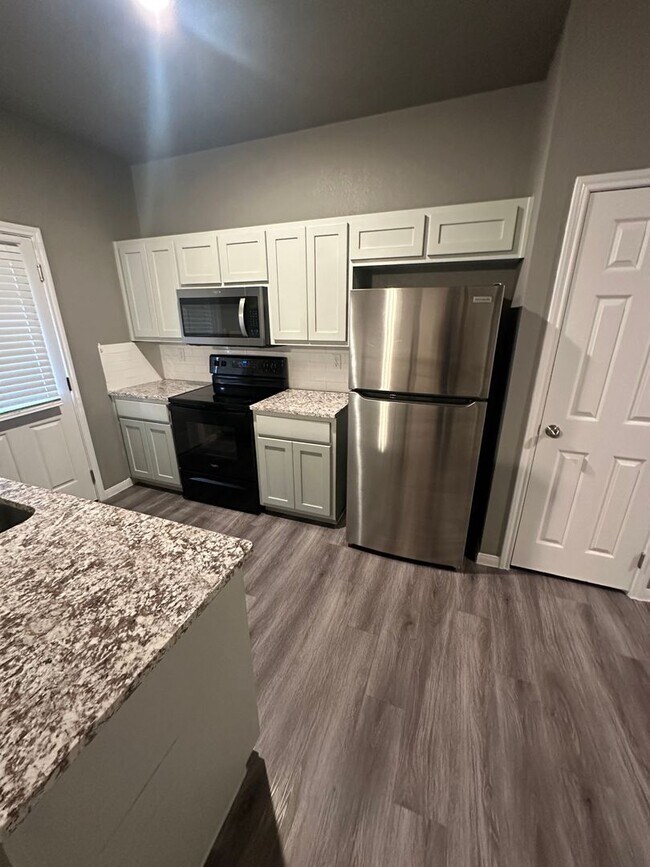 Building Photo - NEW IN MANAGEMENT - AVAILABLE NOW!