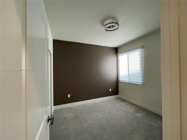 Building Photo - 4460 NW 83rd Ave