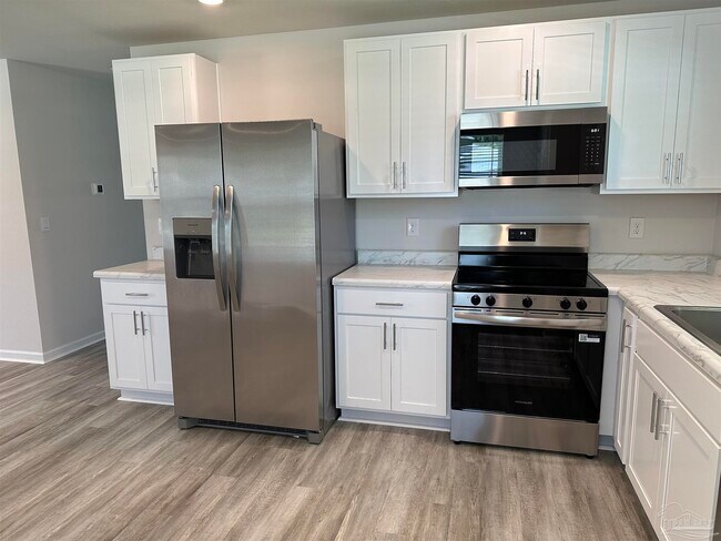 Building Photo - 6497 Firefly Dr