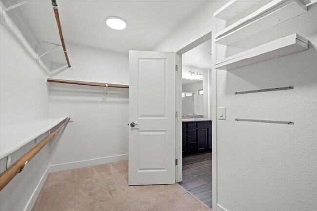 Building Photo - Modern Gated 3 Bedroom Retreat with Loft & Entertainer’s Backyard