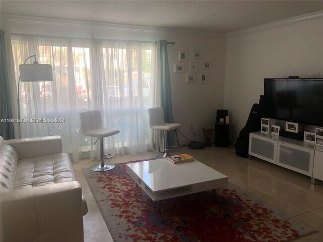 Building Photo - 9971 W Bay Harbor Dr