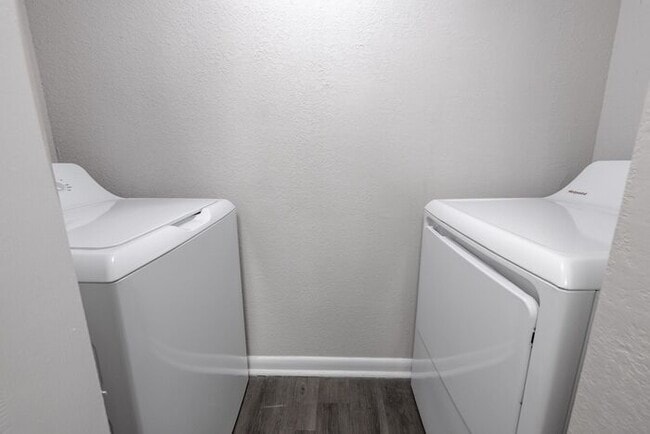 Building Photo - Spacious 2-Bedroom Elite Apartment with Private Balconies & Washer/Dryer