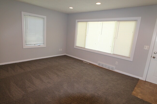 Building Photo - Awesome with updates! 3 bedroom with garag...