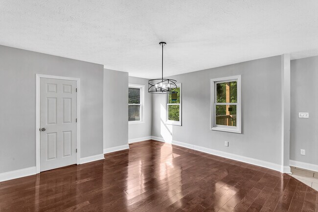 The door on the left is access to the half bath. The entire house has been re-plumbed - 2416 Magee Road Ext
