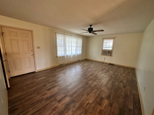 Building Photo - 4-Bedroom Brick Home with Full Unfinished ...