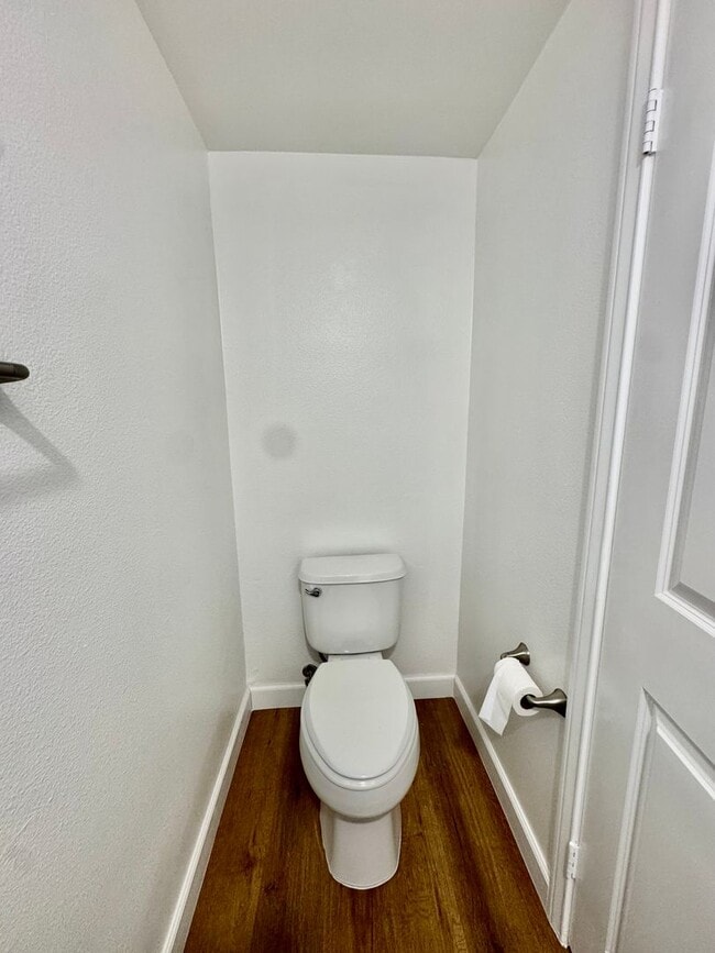 Building Photo - Beautifully Remodel Townhouse with AC & Two Car Garage!