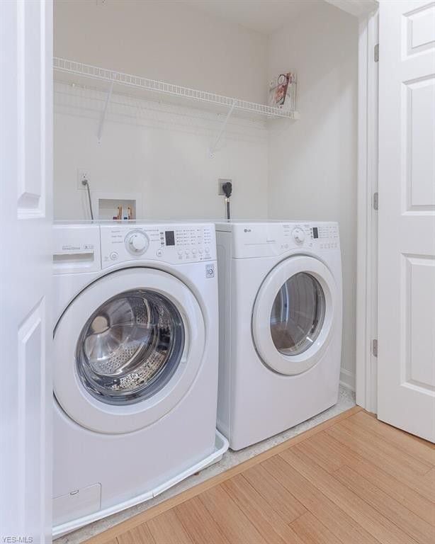 Full-sized washer and dryer. Nearby apartments have small stackable washers and dryers which won't fit a comforter for washing. - 1263 W 74th St.