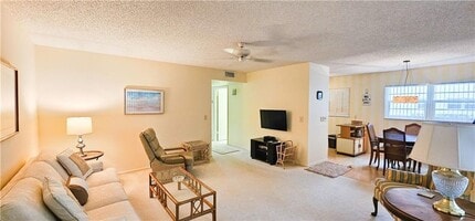 Building Photo - Annual Fully Furnished 2/2 Condo with Golf Views 55 + Community