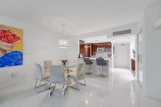 Building Photo - 10275 Collins Ave