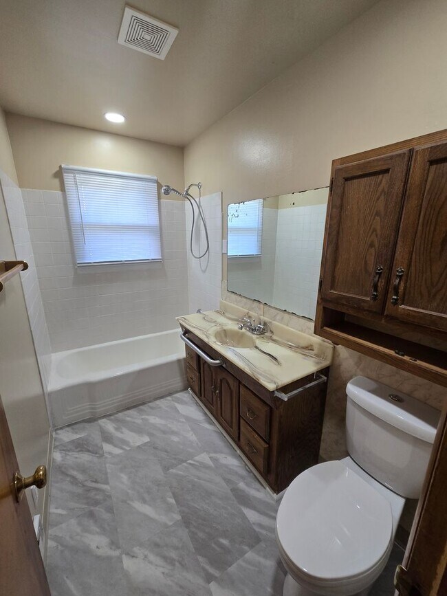 Building Photo - Remodeled 3-4 Br, 2 Bath Ranch style home, fenced in yard, garage, patio, full basement