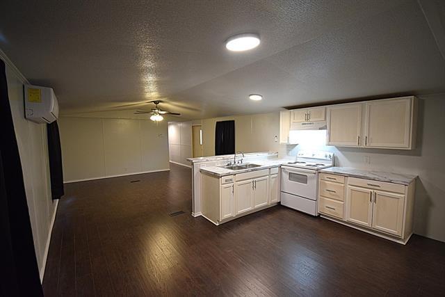 Building Photo - 6000 Spring Creek Rd